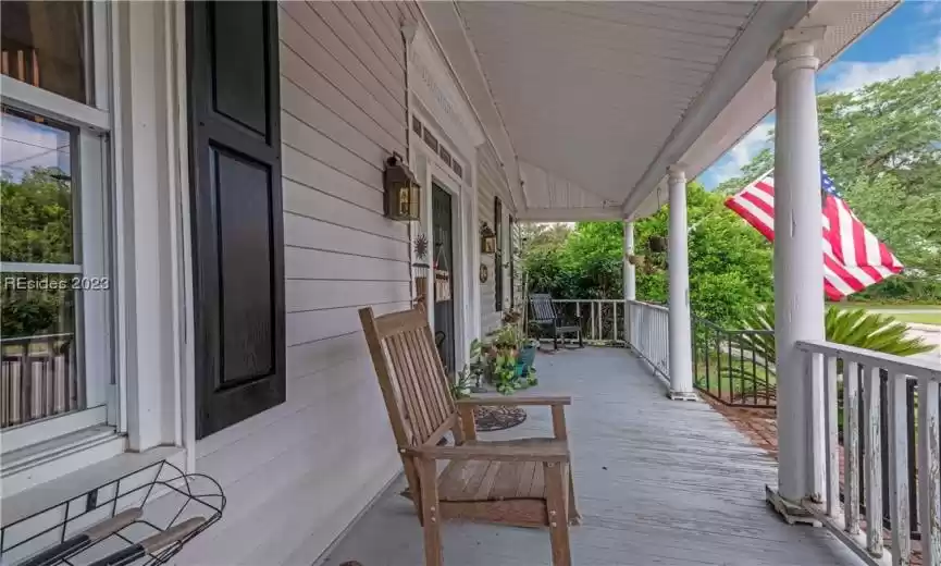 A large front porch filled with Southern charm is a truly inviting and iconic feature of homes in the Lowcountry.