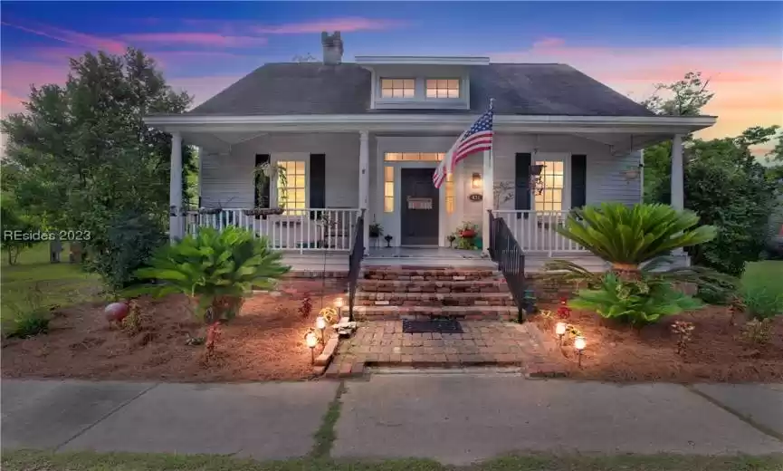 Awesome twilight view of this gorgeous home a true southern charmer.