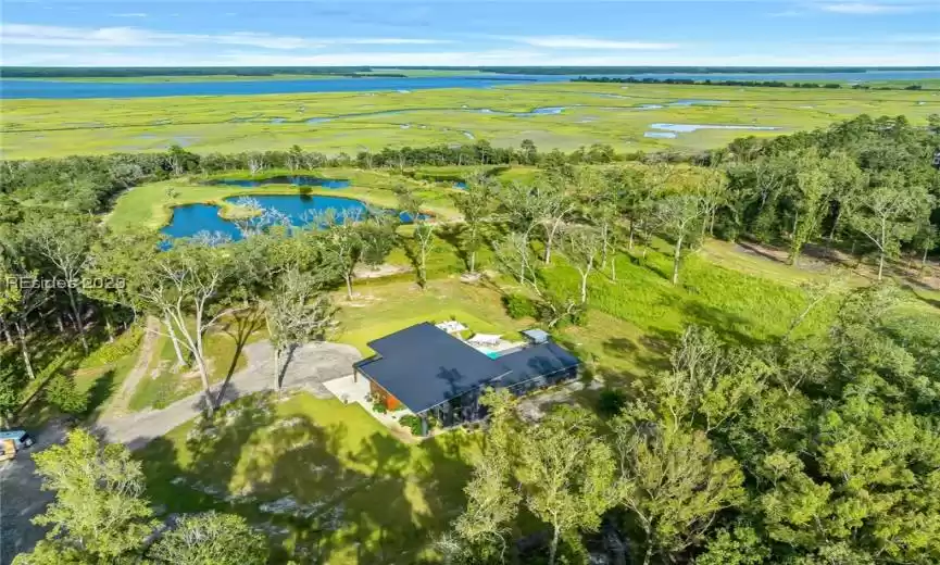 7.5 ACRE FLOODED IMPOUNDMENT W/ A VARIETY OF WATERFOWL, DEER, TURKEY, DOVE, & EAGLES.