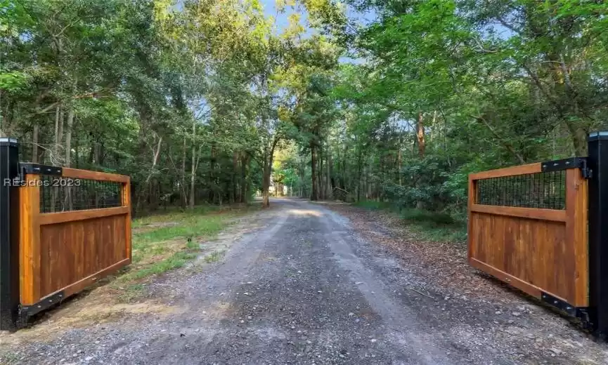 BRAND NEW GATED ENTRANCE. 1OF2 ENTRANCES. PROPERTY NOT VISIBLE FROM KNOWLES ISLAND RD.