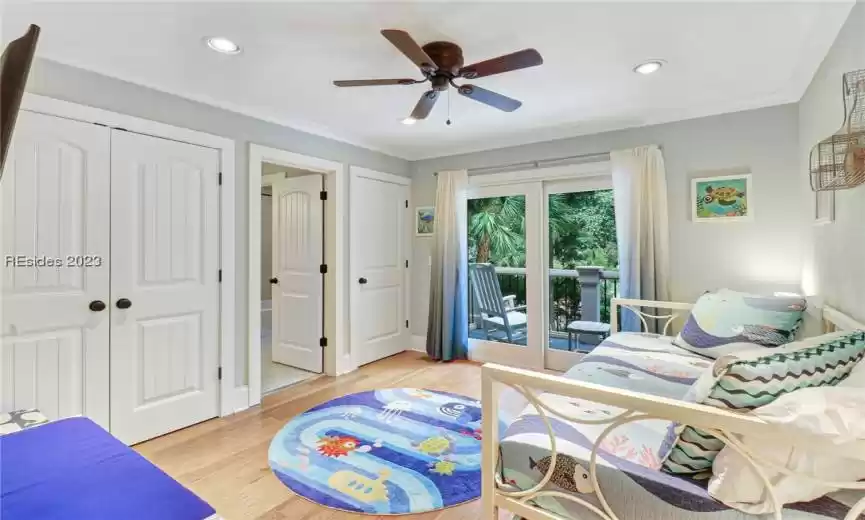Adorable 1st floor kids room with access to the balcony.