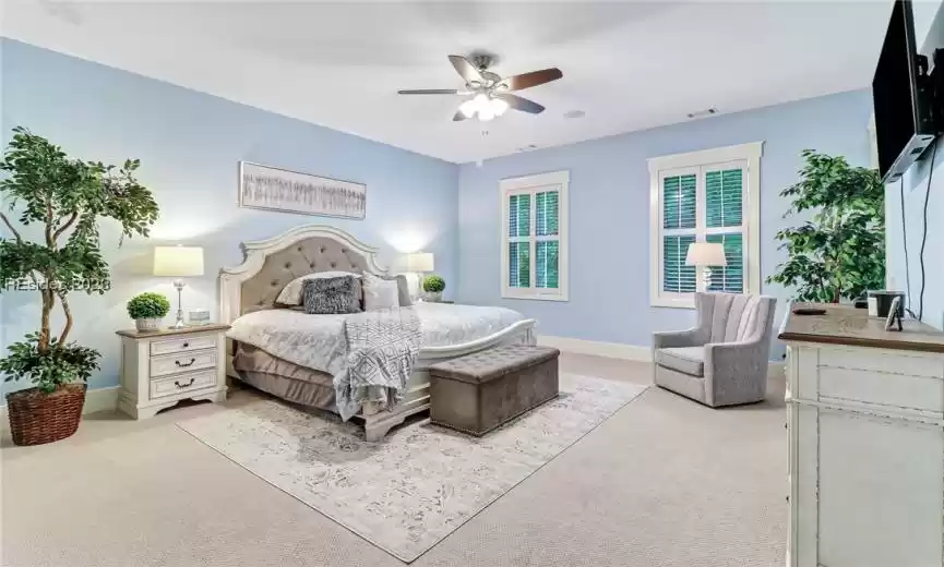 Bedroom 3. Note the space, window trim details, and plantation shutters.