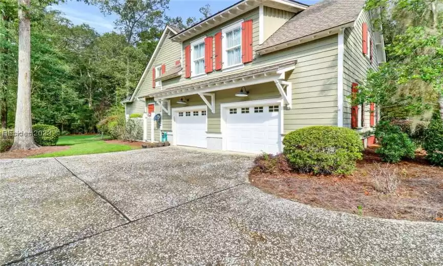 Oversized garage for 2 cars and more.