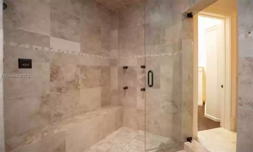 Shared primary bedroom steam shower.