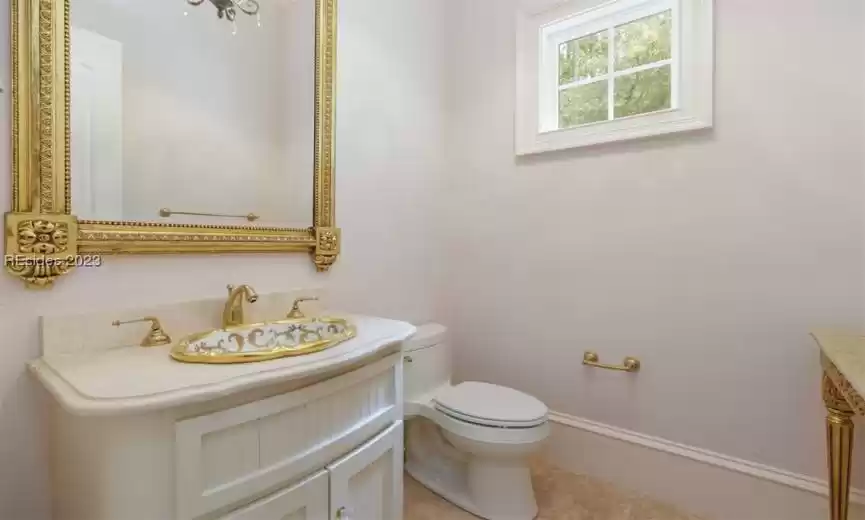 Gorgeous half bath downstairs for guests.