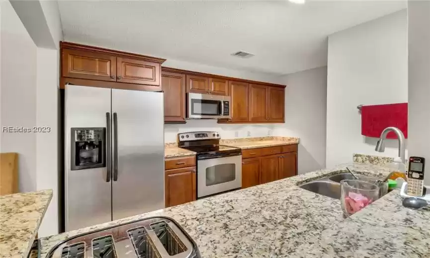 Remodeled kitchen opens to living room