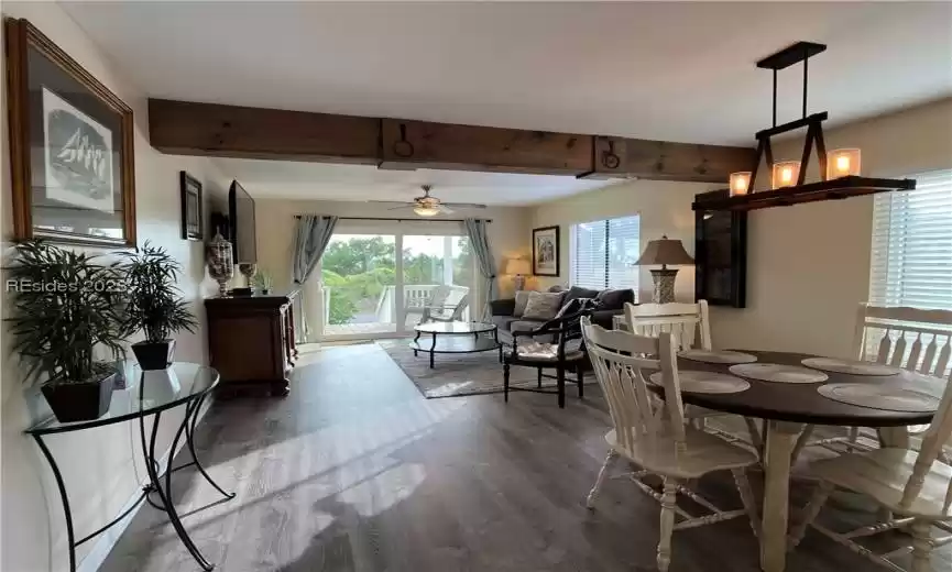 Open floor plan from dining room into living area