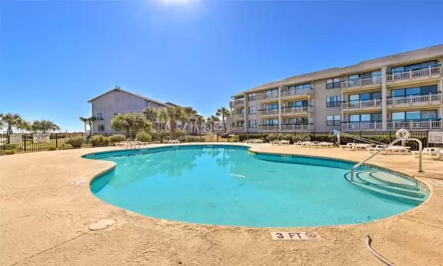 View of HI Beach House Inn & Villas pool