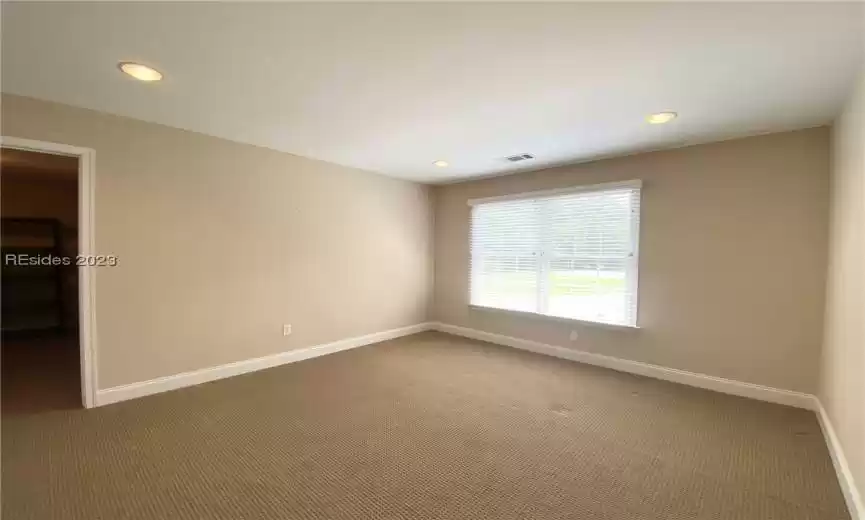 Upstairs Bedroom 2 with large closet and another extra storage closet.