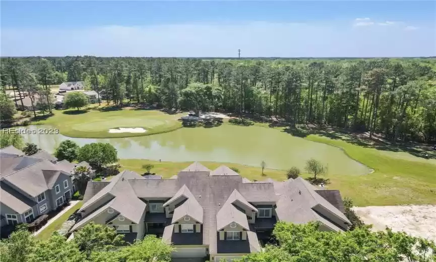 Drone view showcasing the home positioned on the left side of the homes shown.