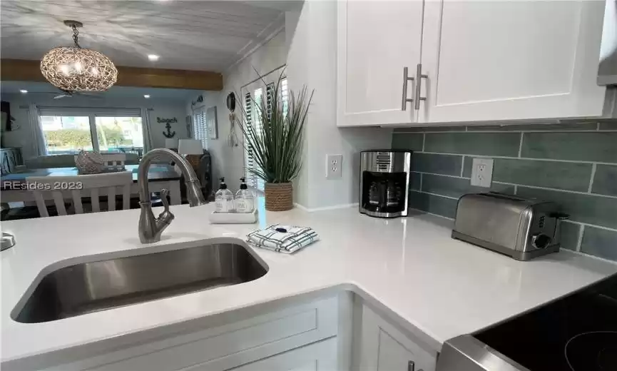 Absolutely beautiful backsplash and countertops.