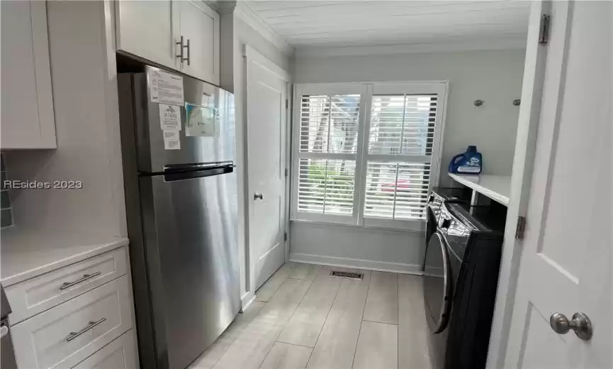 Laundry room and countertop to fold clothes.