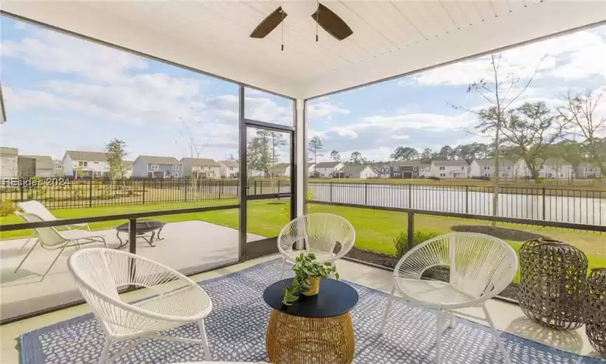 Screened-in Porch with ceiling fan overlooking the tranquil lagoon