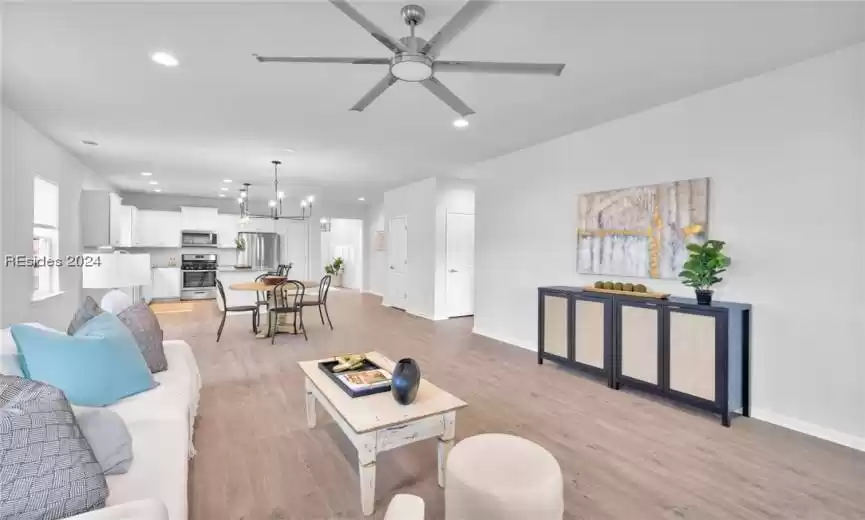 Spacious Living area with ceiling fan