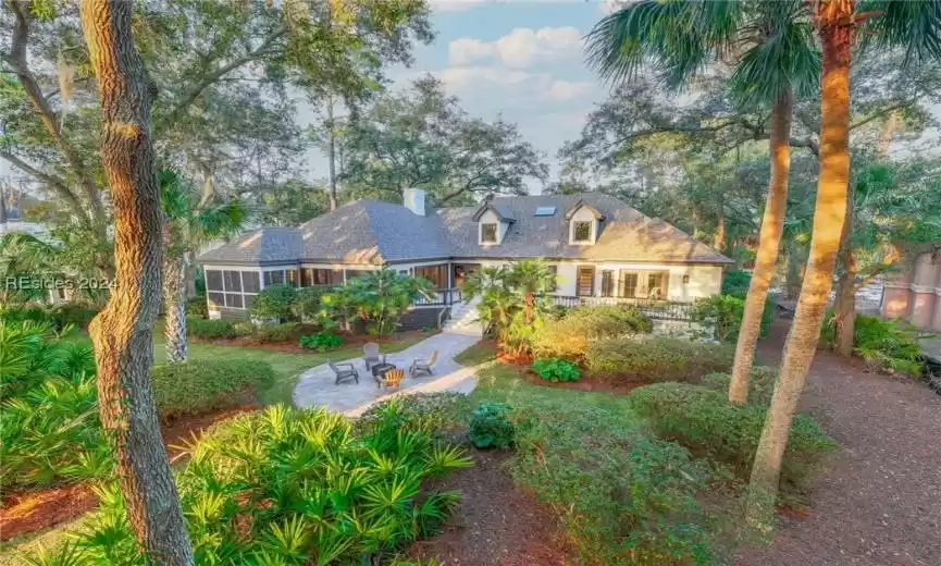 View of the backyard. Beautiful setting with a large homesite, at almost 1/2 acre of property in Wexford, on the South end of Hilton Head Island, just a few  miles from the beach!