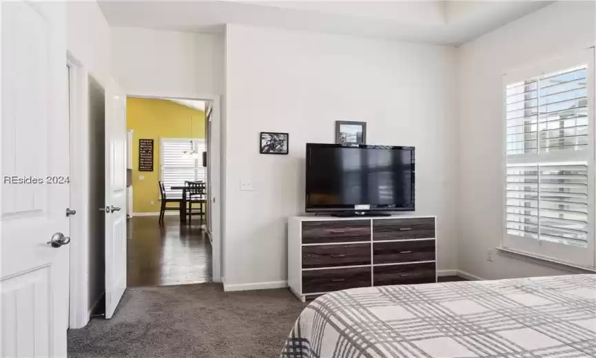 Bedroom featuring dark hardwood / wood-style floors