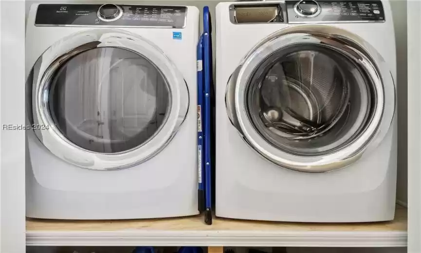 Laundry room with washer and dryer