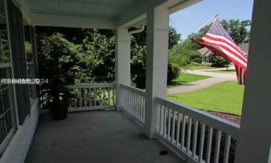 View of terrace featuring a porch