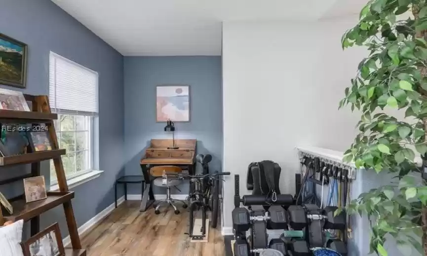 Living area with wood-type flooring