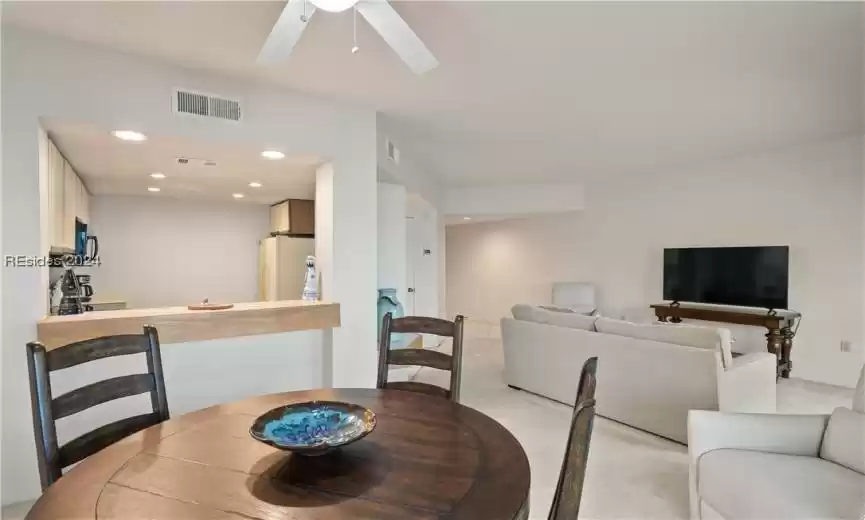 Great view to show the layout from the dining room into the living room and kitchen.