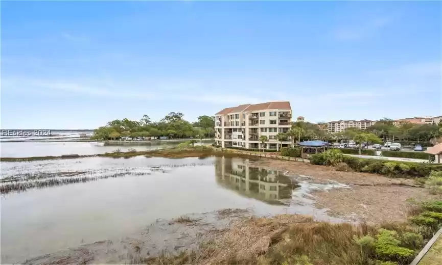 High Tide at Captains Quarters overlooking Broad creek and with views of Starboard building.