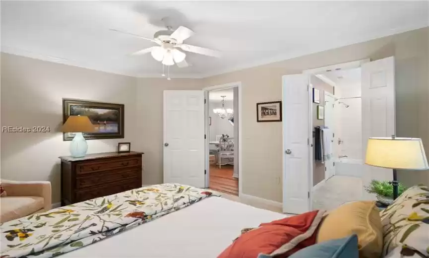 Another view of the guest bedroom showing the access to the bedroom and hallway.