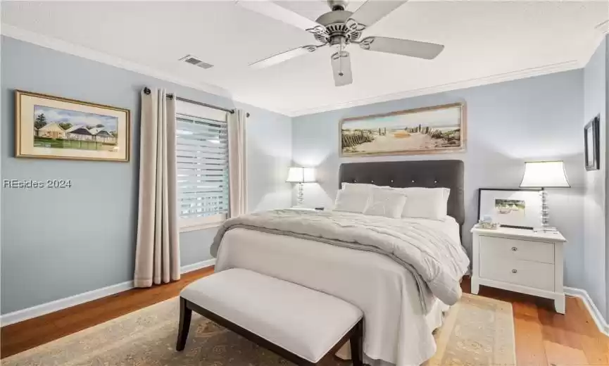 Peaceful primary bedroom with plantation shutters - all furniture stays (rug, lamps, pictures and mirror do not)