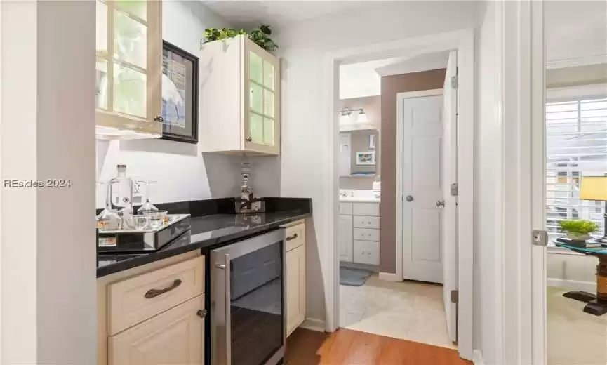 Great bar area that includes the stainless wine refrigerator and 2 lighted glass cabinets.