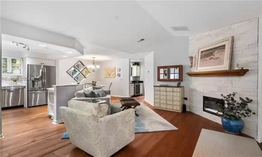 Perfect finishes are throughout the home from the electric heated fireplace to the hidden TV behind the mirrored cabinet. All furniture and TV stays.