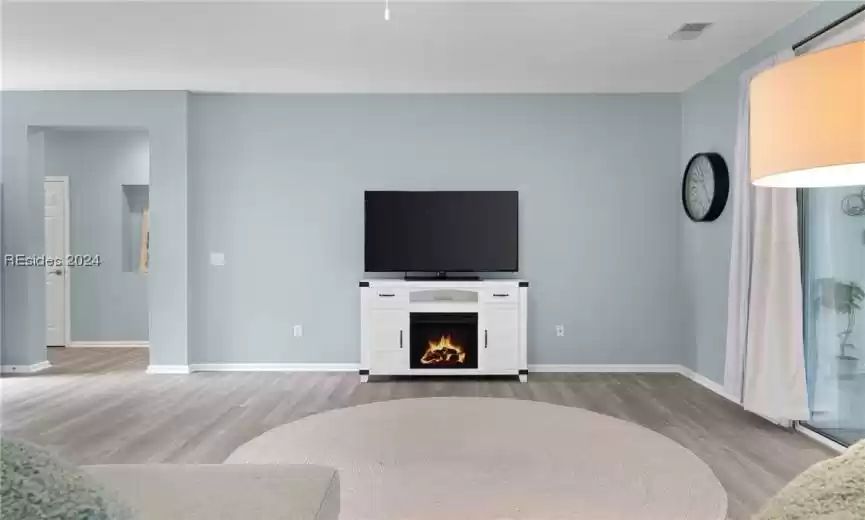 Living room featuring light hardwood / wood-style flooring