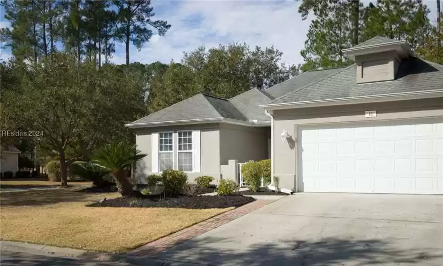 View of front facade with a garage