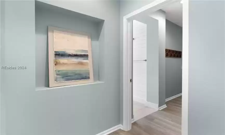 Hall with light wood-type flooring