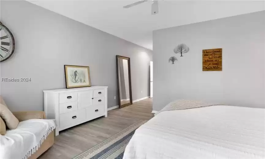 Bedroom featuring light wood-type flooring and ceiling fan