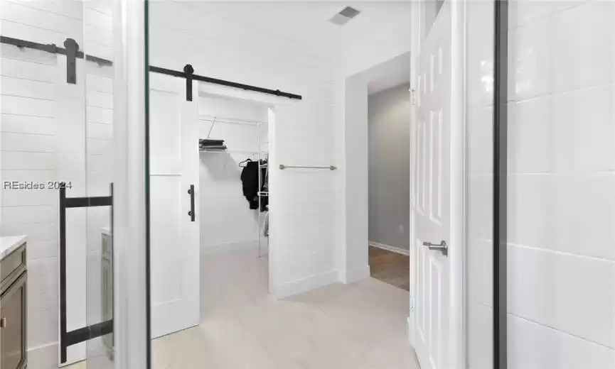 Bathroom featuring vanity and hardwood / wood-style floors