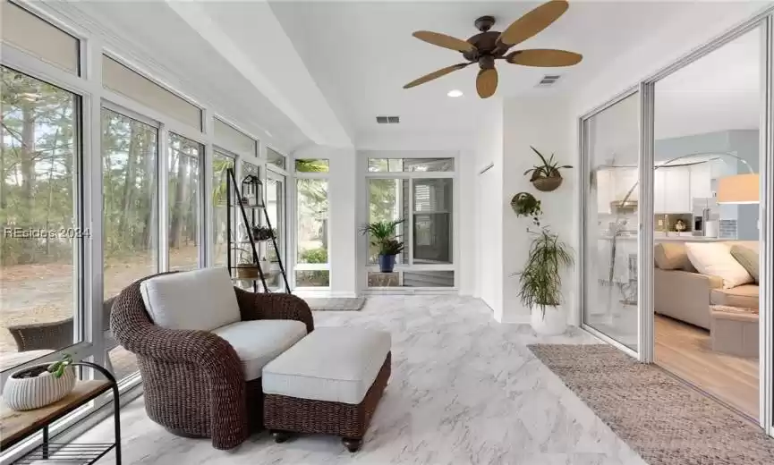 Sunroom with ceiling fan