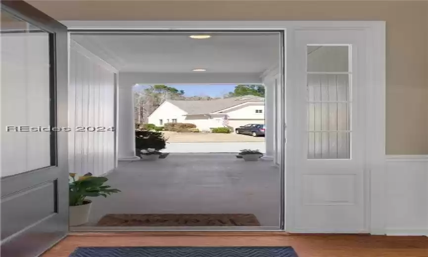 Doorway featuring light hardwood / wood-style floors