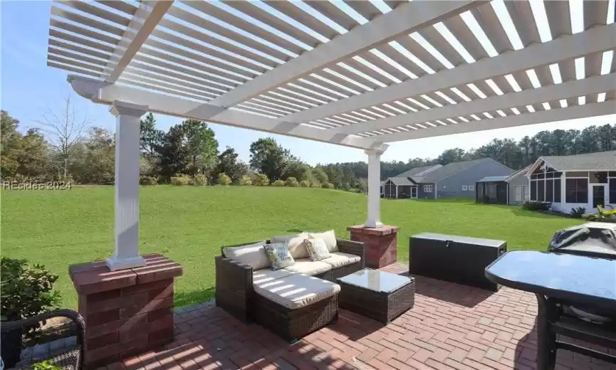 View of terrace featuring an aluminum pergola