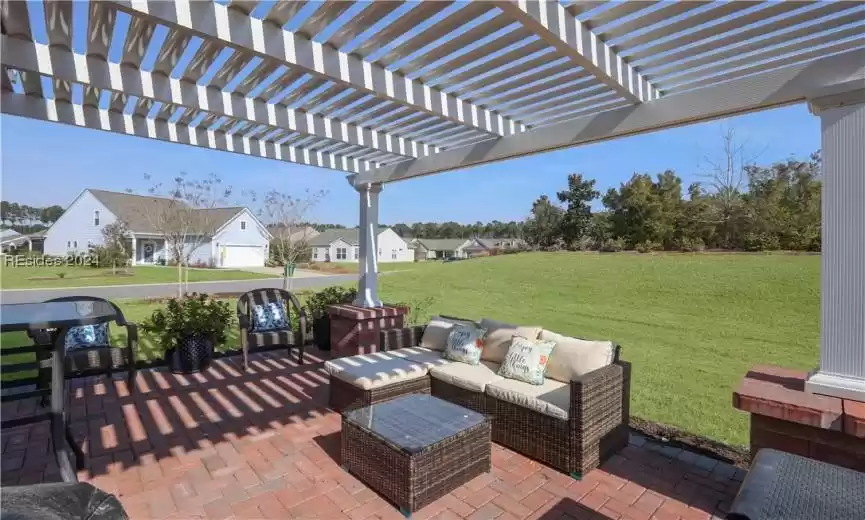 View of patio/terrace with an aluminum pergola is a great place to entertain