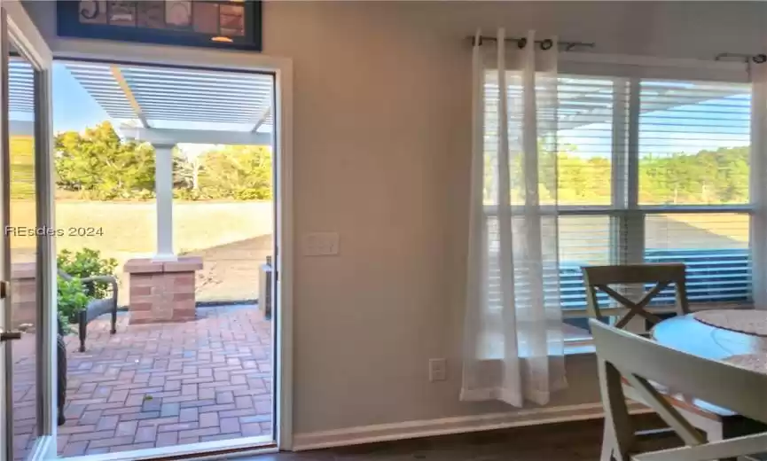View of doorway from the Carolina Room looking out at the paver patio.
