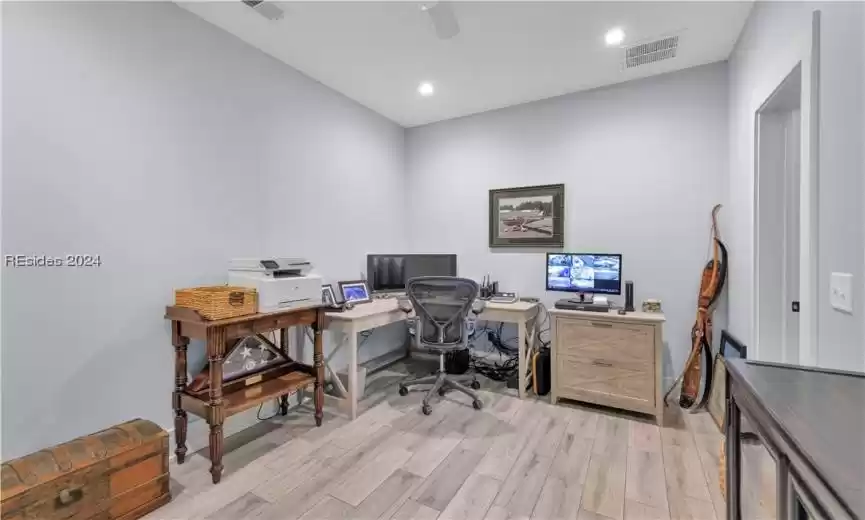 Office with access from kitchen as well as garage