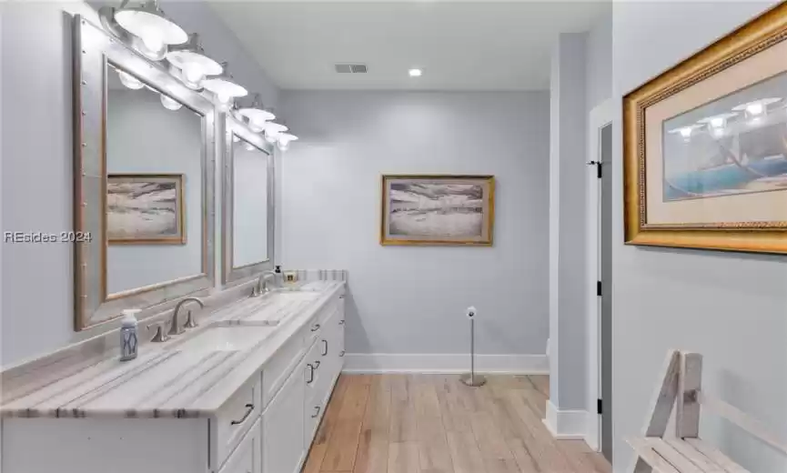 Master Bath with his and her walk-in closets
