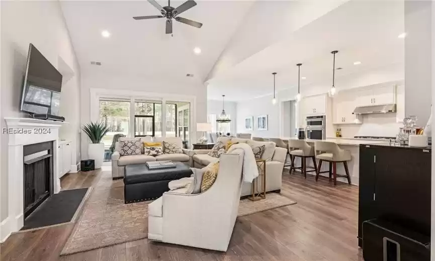 Great room with cathedral ceiling is open and welcoming