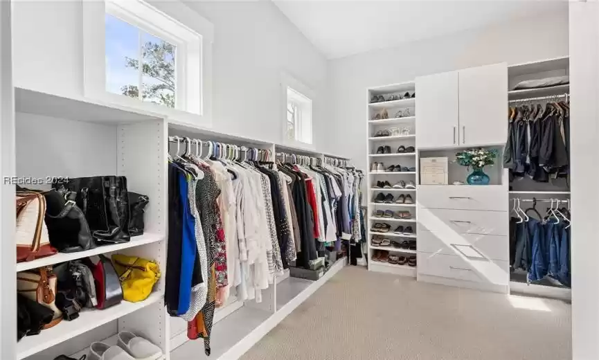 Closet has been outfitted with designer built-ins