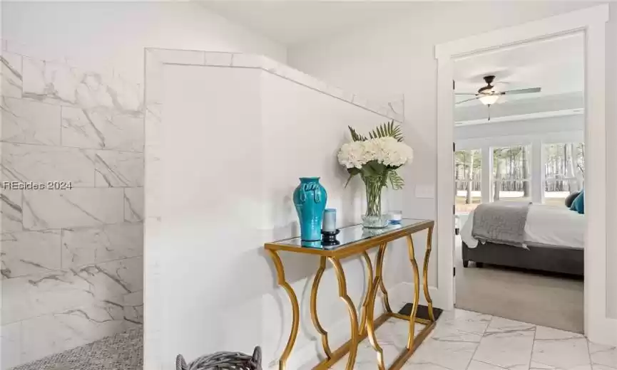Primary bath has enormous walk in shower