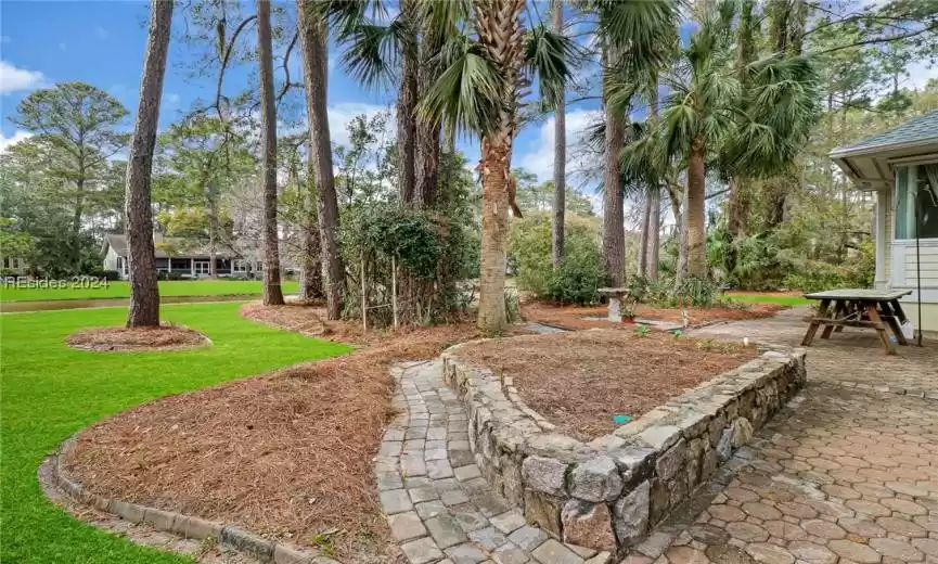 Wonderful back patio with picnic table.