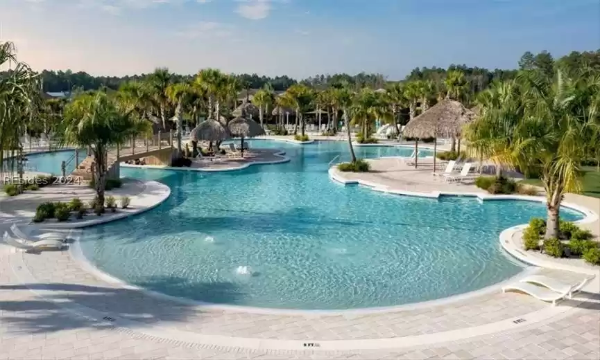 View of pool featuring a patio and pool water feature