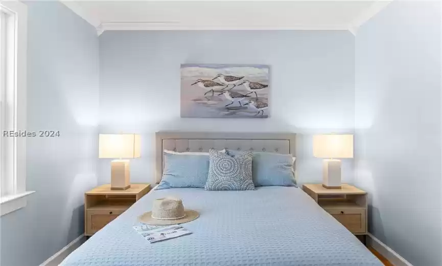 Bedroom featuring ornamental molding