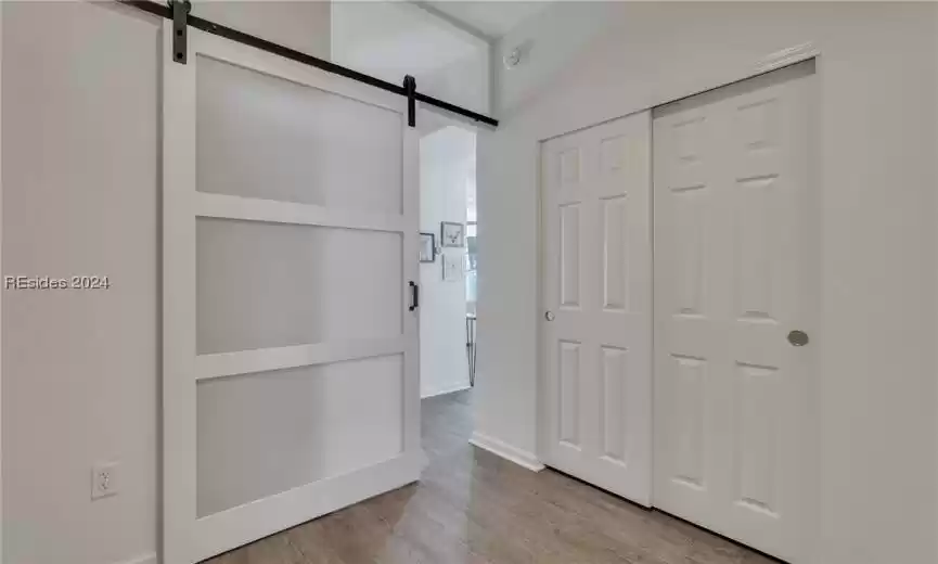 Privacy barn door for guest suite.