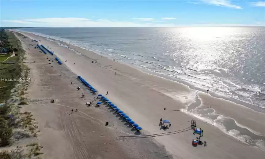 Bird's eye view featuring a beach view and a water view