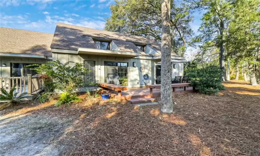 View of front of house with a deck